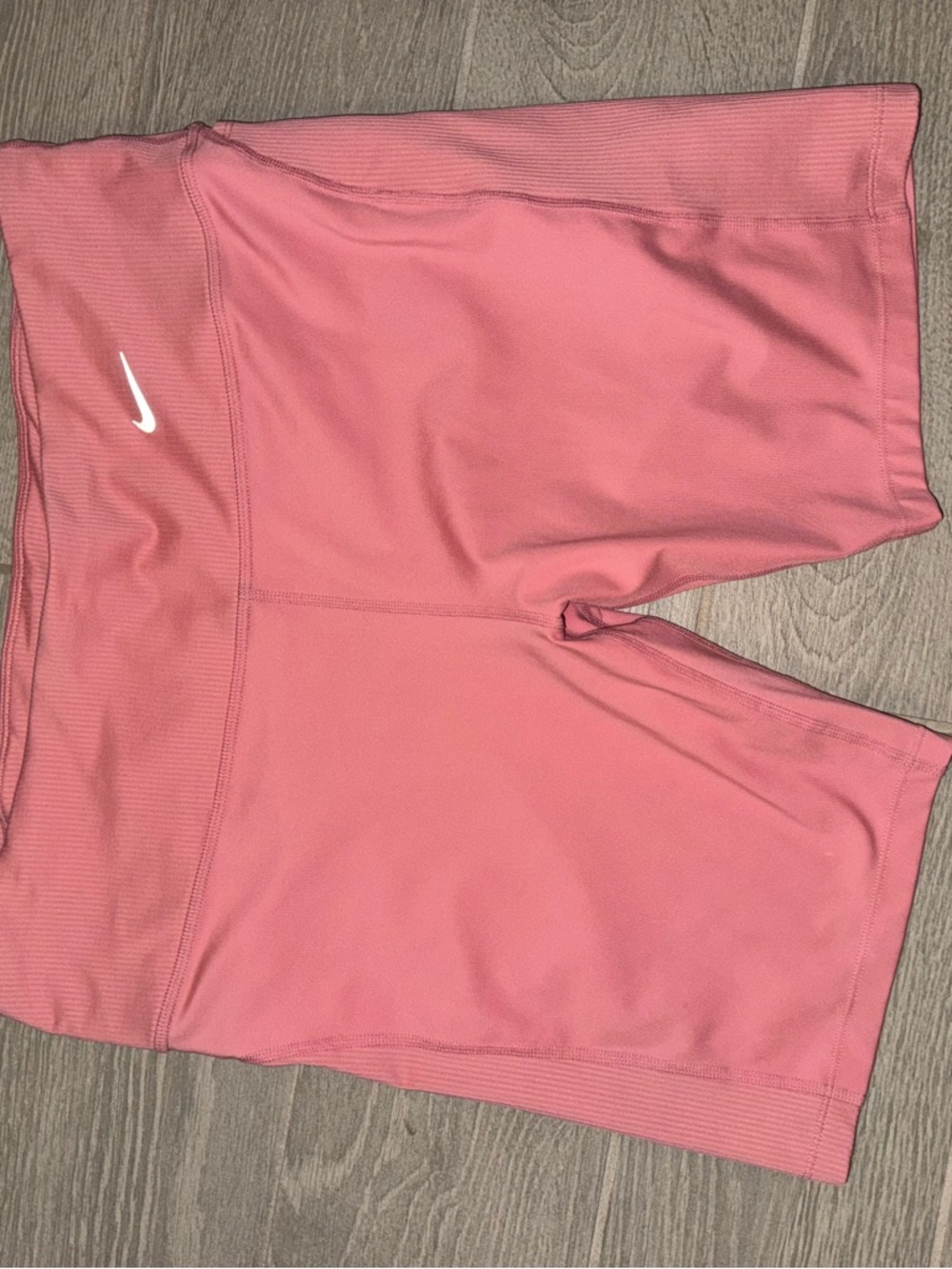 Nike Women’s Coral Pink Bike Shorts with White Swoosh